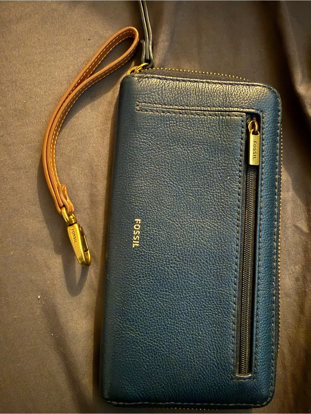 Fossil wallet and fossil wristlet clip